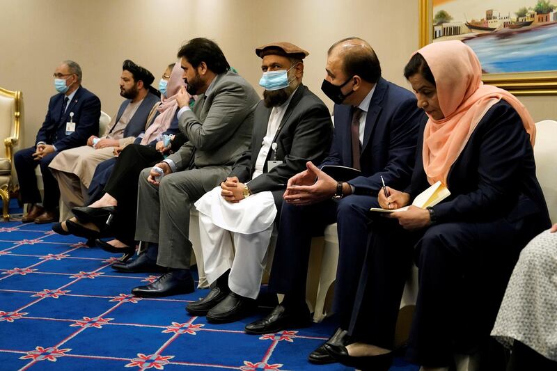 Members of peace negotiation team of the Islamic Republic of Afghanistan attend a meeting with U.S. Secretary of State Mike Pompeo, amid talks between the Taliban and the Afghan government, in Doha, Qatar November 21, 2020. Patrick Semansky/Pool via REUTERS