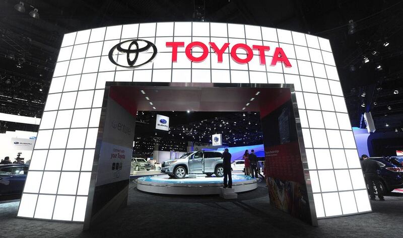 The 2014 Toyota Highlander Hybrid is displayed at the LA Auto Show. AFP PHOTO/Frederic BROWN

