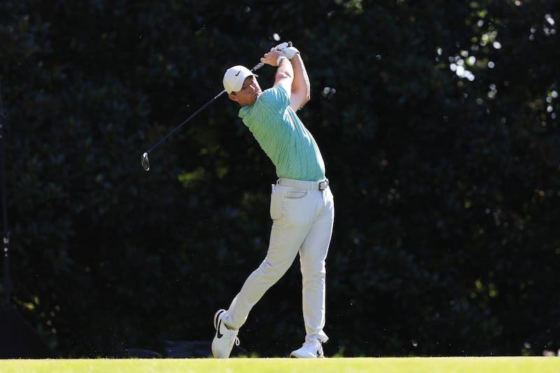 Rory McIlroy plays his shot from the 17th tee. AFP
