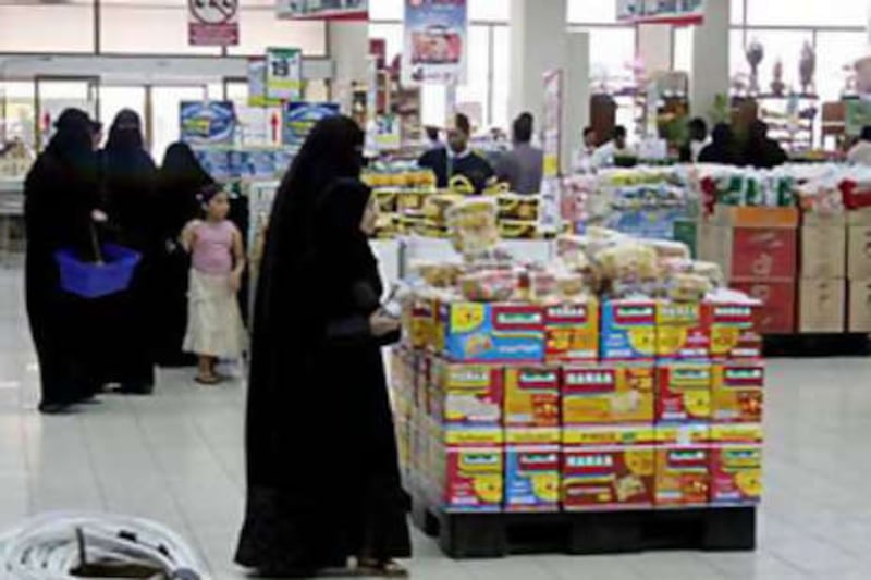 Shoppers in a supermarket in Riyadh.