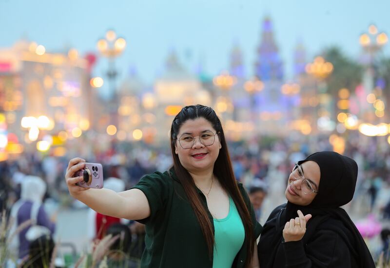Selfies for New Year's Eve at Global Village, Dubai. Chris Whiteoak / The National