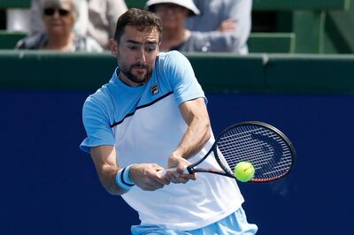 MELBOURNE, AUSTRALIA - JANUARY 09: Marin Cilic of Croatia  plays a backhand in his match against Kevin Anderson of South Africa during day two of the 2019 Kooyong Classic at the Kooyong Lawn Tennis Club on January 09, 2019 in Melbourne, Australia. (Photo by Darrian Traynor/Getty Images)