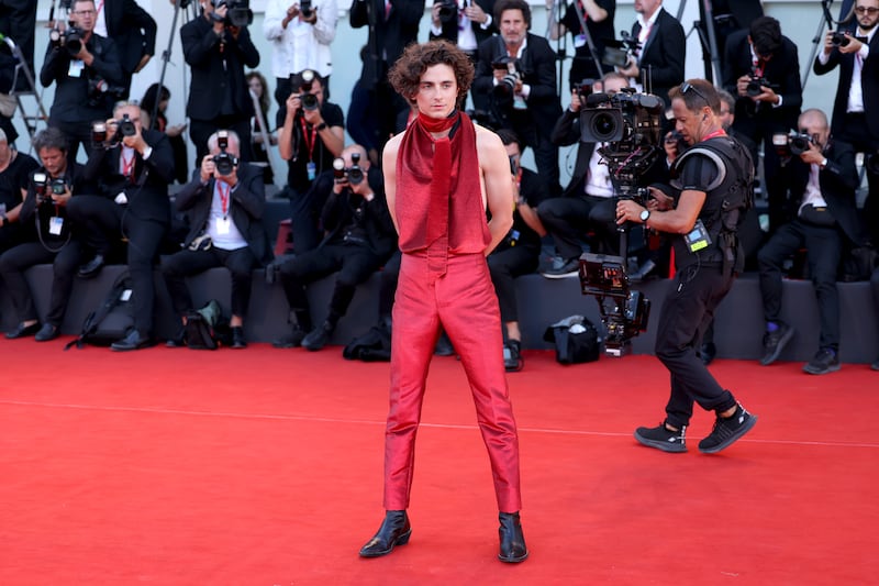 Timothee Chalamet in a backless outfit from Haider Ackermann. Getty 