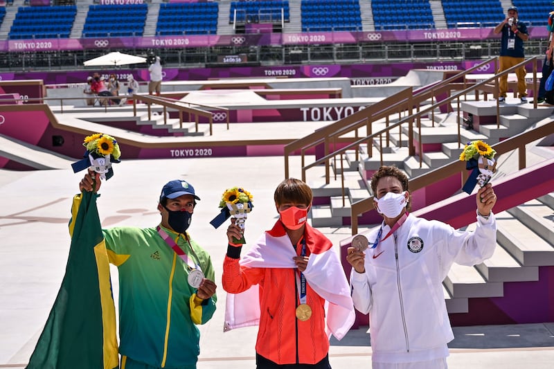 Gold medallist Japan's Yuto Horigome, silver medallist Brazil's Kelvin Hoefler and bronze medallist Jagger Eaton of the US.