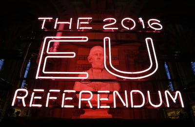 A neon sign for the 2016 referendum is attached to the doors of the announcement hall in Manchester Town Hall on June 23, 2016. AFP