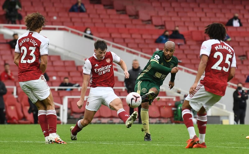 David McGoldrick - 7: Barely featured as an attacking option until the 35th minute when he followed up a smart turn by curling a shot high and wide of the target. Fine left-footed finish with eight minutes left hauled the Blades back into the match. Saw injury-time shot deflected wide by Ainsley-Niles. AP