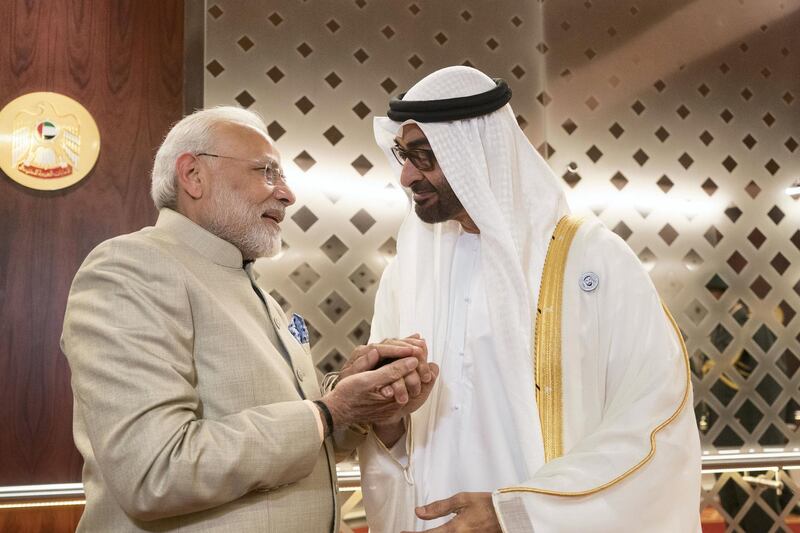 ABU DHABI, UNITED ARAB EMIRATES - February 10, 2018: HH Sheikh Mohamed bin Zayed Al Nahyan Crown Prince of Abu Dhabi Deputy Supreme Commander of the UAE Armed Forces (R), receives HE Narendra Modi Prime Minister of India (L), at the Presidential Airport.

( Rashed Al Mansoori / Crown Prince Court - Abu Dhabi  )
---