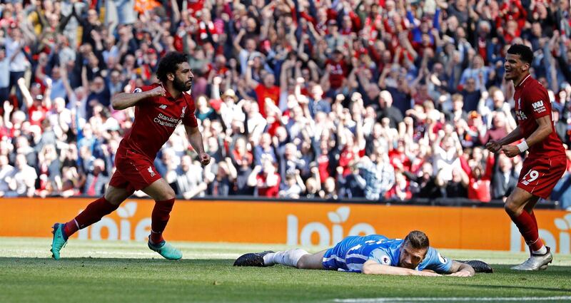 Soccer Football - Premier League - Liverpool vs Brighton & Hove Albion - Anfield, Liverpool, Britain - May 13, 2018   Liverpool's Mohamed Salah celebrates scoring their first goal   REUTERS/Phil Noble    EDITORIAL USE ONLY. No use with unauthorized audio, video, data, fixture lists, club/league logos or "live" services. Online in-match use limited to 75 images, no video emulation. No use in betting, games or single club/league/player publications.  Please contact your account representative for further details.