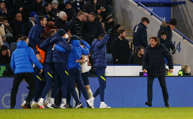Tottenham manager Antonio Conte, right, and Spurs players and staff celebrate the victory. Reuters