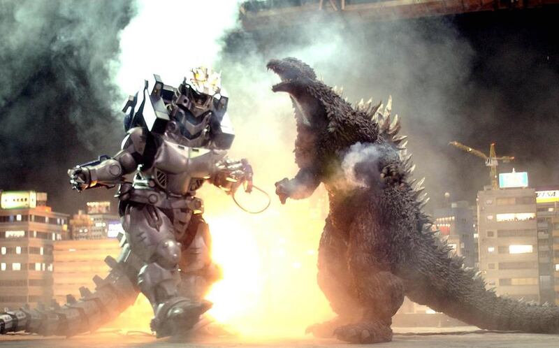 The character Godzilla, right, fights Mechagodzilla during a demonstration at the Toho film studio in Tokyo on July 16, 2002. Tsugufumi Matsumoto / AP Photo