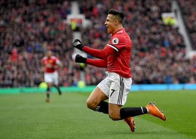 MANCHESTER, ENGLAND - MARCH 31:  Alexis Sanchez of Manchester United celebrates after he scores their second goal during the Premier League match between Manchester United and Swansea City at Old Trafford on March 31, 2018 in Manchester, England.  (Photo by Ross Kinnaird/Getty Images)