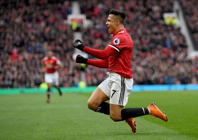 MANCHESTER, ENGLAND - MARCH 31:  Alexis Sanchez of Manchester United celebrates after he scores their second goal during the Premier League match between Manchester United and Swansea City at Old Trafford on March 31, 2018 in Manchester, England.  (Photo by Ross Kinnaird/Getty Images)