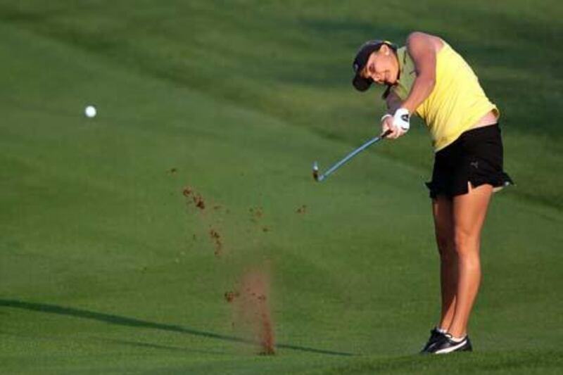 DUBAI, UNITED ARAB EMIRATES - DECEMBER 09:  Alexis Thompson of the USA plays her second shot at the 10th hole during the second round of the 2010 Omega Dubai Ladies Masters on the Majilis Course at The Emirates Golf Club on December 9, 2010 in Dubai, United Arab Emirates.  (Photo by David Cannon/Getty Images)