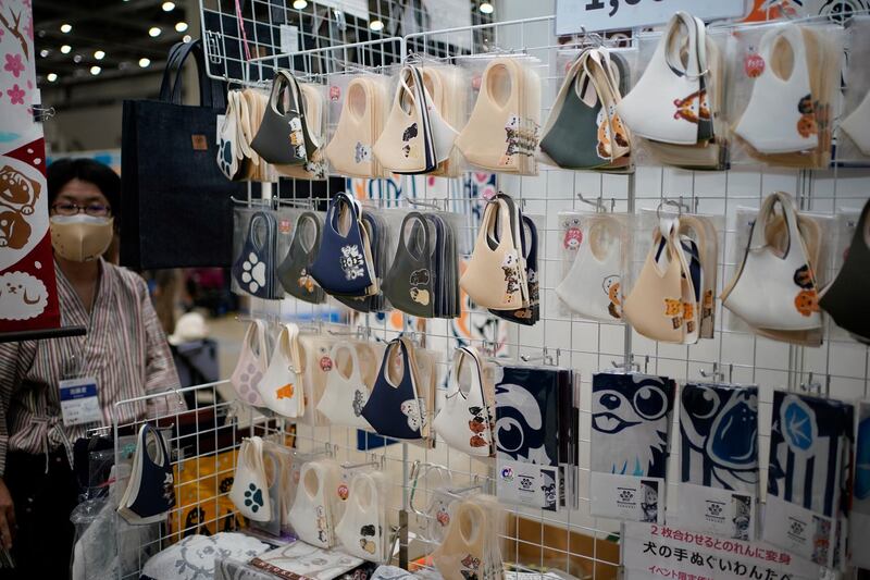 Face masks with dogs and cats illustrations are displayed at the 'Interpets' international pet fair in Tokyo, Japan. As the coronavirus pandemic is limiting access from abroad, some 300 exhibitors based in Japan will present their products to business visitors and pet lovers until 04 April at the event, which is the largest international trade fair in the Japanese pet market. With the COVID-19 pandemic, pets are giving comfort to people who are spending more time home due to lockdowns and telework, boosting the pet products market.  EPA