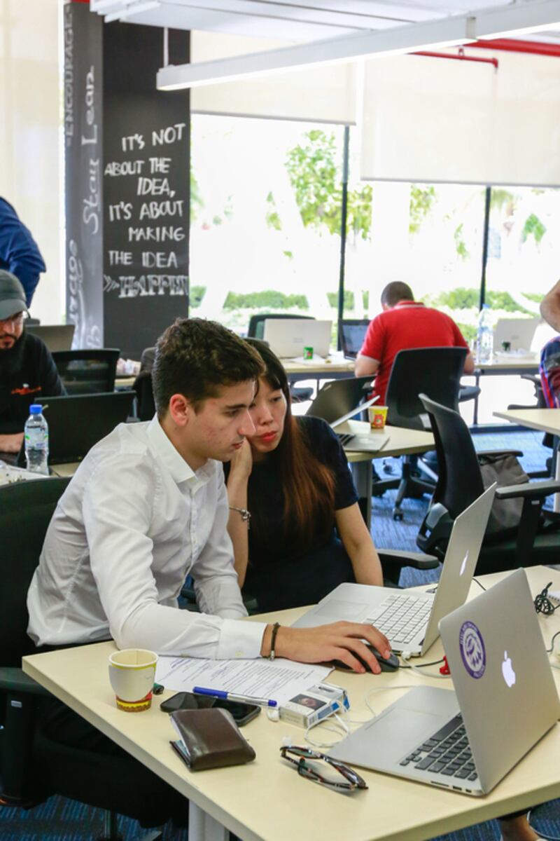 Participants at the Dubai Startup Weekend at Astrolabs Dubai. Victor Besa for The National