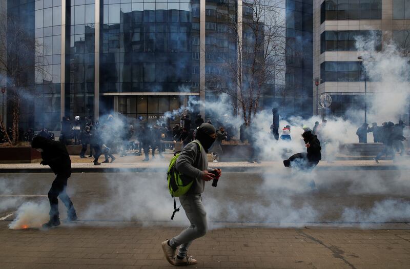 Protesters confront police in Brussels' EU quarter. Reuters