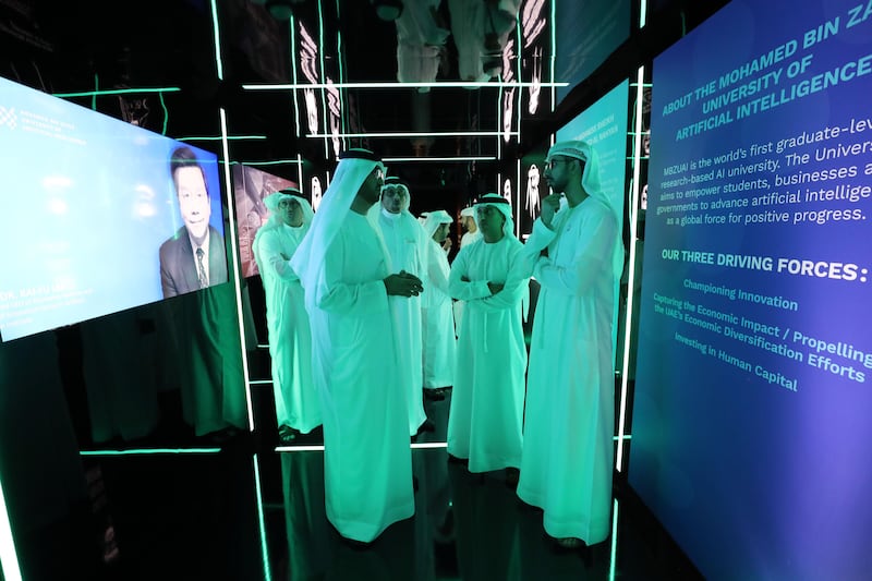 Abu Dhabi, United Arab Emirates - October 16, 2019: L-R Dr Sultan Ahmed Al Jaber, Dr. Ahmad bin Abdullah Humaid Belhoul Al Falasi and Omar Bin Sultan Al Olama. The launch of Mohamed bin Zayed University of Artificial intelligence. Wednesday the 16th of October 2019. Masdar City, Abu Dhabi. Chris Whiteoak / The National