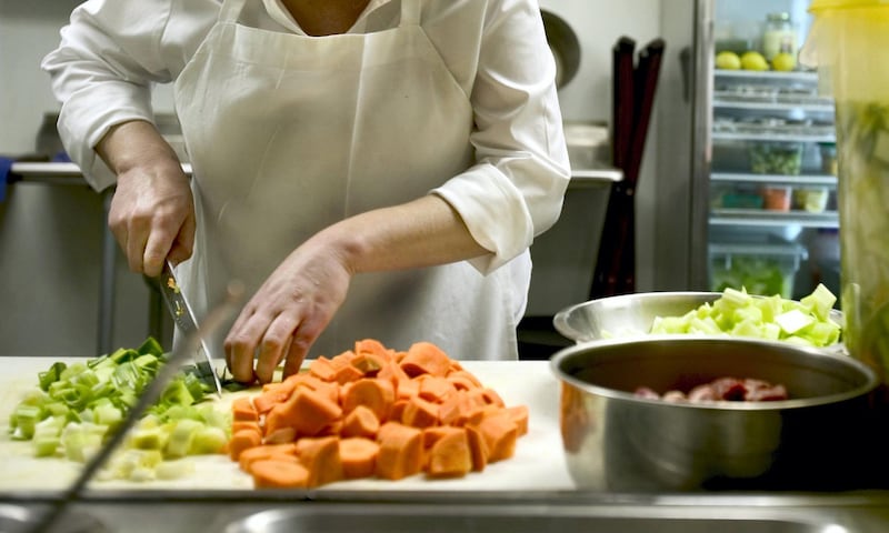 A chef at Molly Malone's in Chicago makes a batch of Irish stew. Among the ingredients in her stew is beef and Guinness.  (Photo by Bob Fila/Chicago Tribune/Tribune News Service via Getty Images)