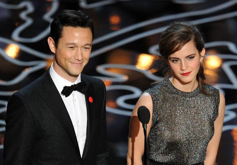 Actors Joseph Gordon-Levitt and Emma Watson speak onstage during the Oscars. Kevin Winter / Getty Images / AFP