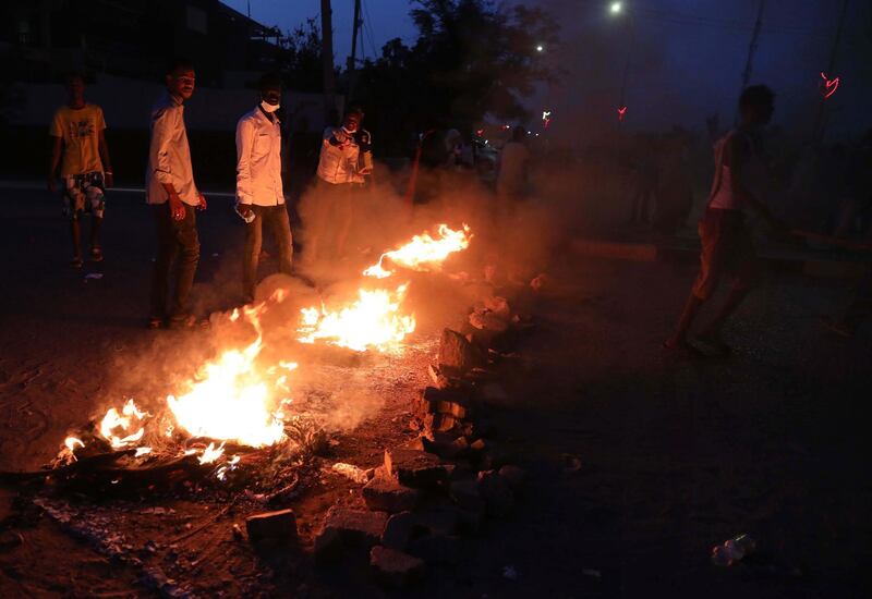 Sudanese protesters burn tyres as they march in protest for the deaths of other protesters earlier the same day in another state of Sudan, Khartoum, Sudan. EPA