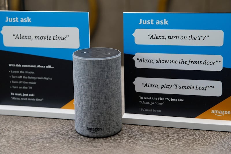 FILE PHOTO: Prompts on how to use Amazon's Alexa personal assistant are seen in an Amazon ‘experience centre’ in Vallejo, California, U.S., May 8, 2018. Picture taken May 8, 2018. REUTERS/Elijah Nouvelage/File Photo