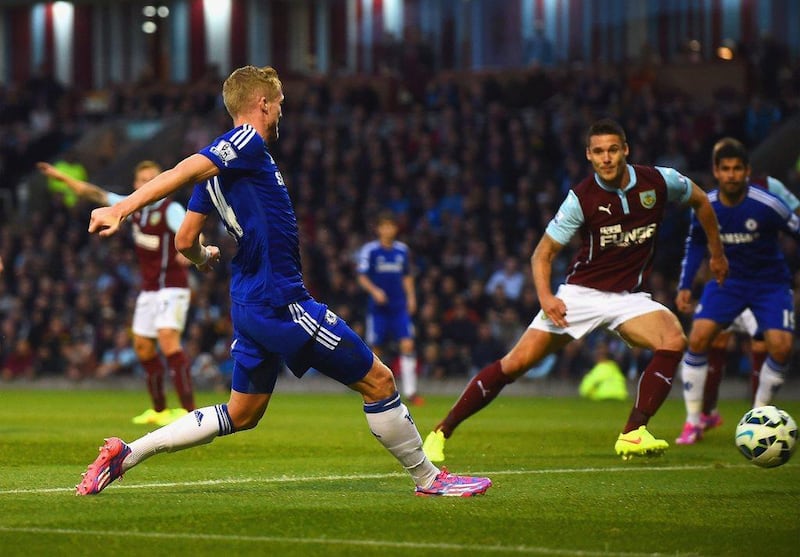 Andre Schurrle of Chelsea scores their second goal against Burnley on Monday night to make it 2-1 in their Premier League match. Laurence Griffiths / Getty Images 

