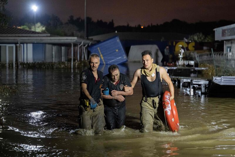A man is rescued and evacuated during flooding in Kucukcekmece district in Istanbul.  AFP