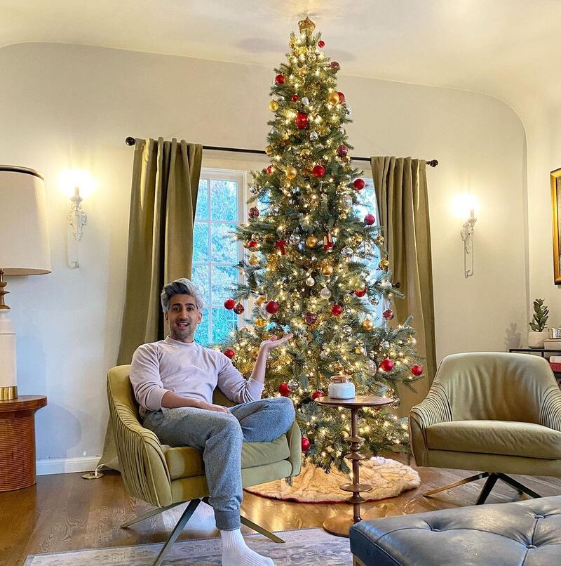 'Queer Eye' star Tan France said that putting his Christmas tree up on Halloween was a '10 year tradition'. Adding: 'Haters back off!'. Instagram / Tan France