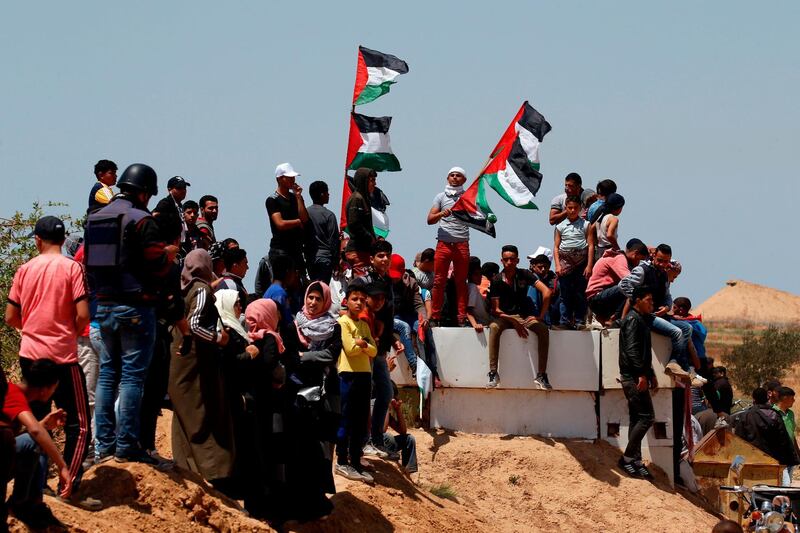 Palestinian demonstrators gather east of Khan Yunis in the southern Gaza Strip  during a protest marking 71th anniversary of 'Nakba'. AFP