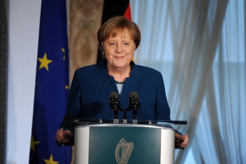 epa07485277 German Chancellor Angela Merkel (L) smiles during a press conference with Irish Prime Minister An Taoiseach Leo Varadkar (R), in Farmleigh, Dublin, Ireland, 04 April 2019. Both leaders discussed the possible second extension of article 50 requested by British Prime Minister May.  EPA/AIDAN CRAWLEY