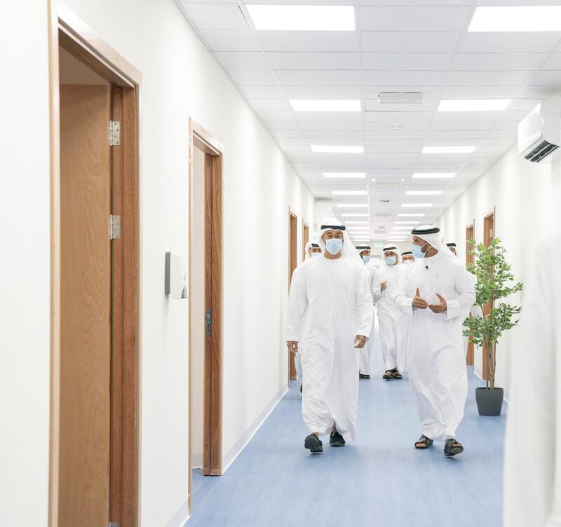 ABU DHABI, UNITED ARAB EMIRATES - May 18, 2020: HH Sheikh Mohamed bin Zayed Al Nahyan, Crown Prince of Abu Dhabi and Deputy Supreme Commander of the UAE Armed Forces (L) visits Emirates Field Hospital, at Emirates Humanitarian City. Seen with HE Sheikh Abdullah bin Mohammed Al Hamed, Chairman of the Department of Health - Abu Dhabi (R).

( Mohamed Al Hammadi / Ministry of Presidential Affairs )
---