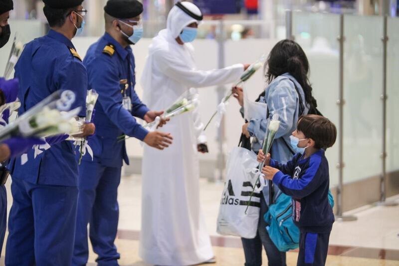 Passengers from Beirut were presented with flowers upon arrival at Dubai International Airport last night. Courtesy: Dubai Customs