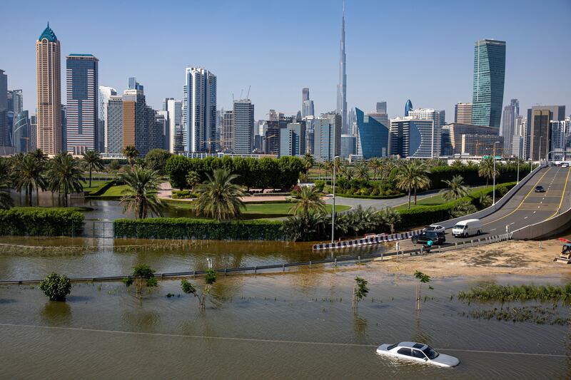 An abandoned vehicle submerged in floodwater following heavy rain in Dubai on April 16. AP