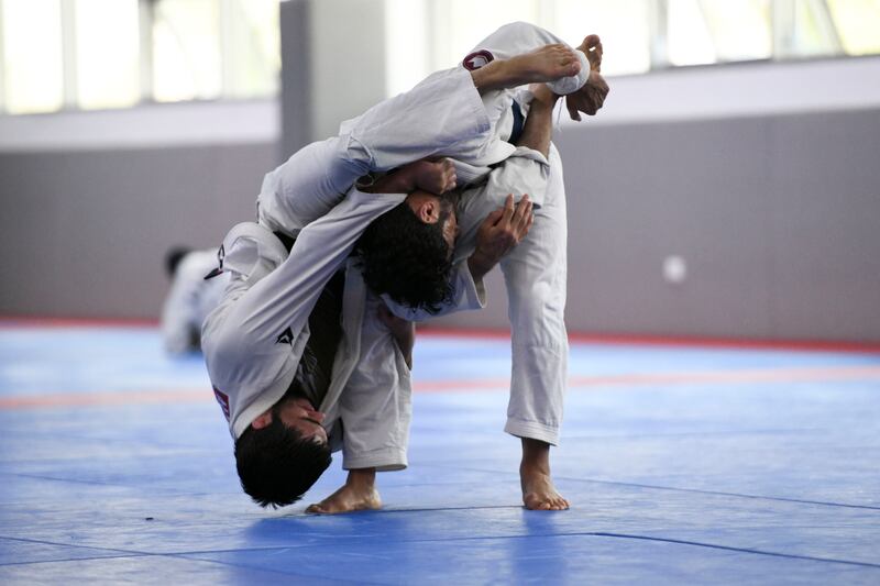Fighters training at Zayed Sports City, Abu Dhabi, for the  Asian Jiu-Jitsu Championship being held in Bahrain. Khushnum Bhandari / The National
