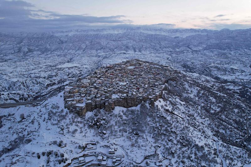 Snow-covered mountains surround the town of Amadiyah, built at an altitude of 1,400 metres above sea level, about 75 kilometres north of the city of Dohuk in the semi-autonomous Iraqi Kurdistan region. AFP