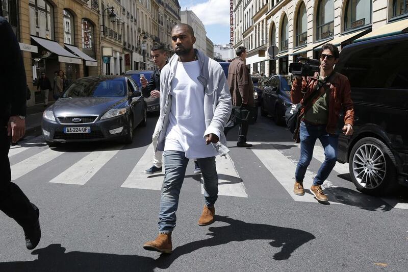 Kanye West arrives at a fashion designer shop in Paris on May 22, 2014. Gonzalo Fuentes / Reuters
