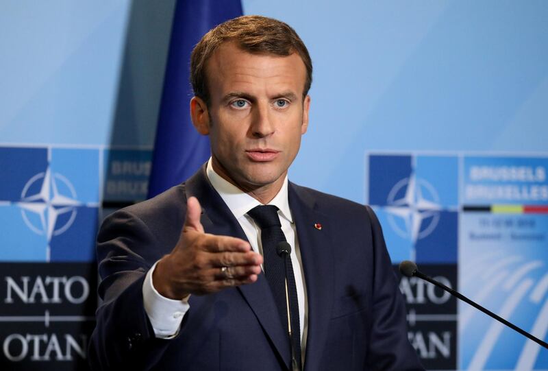 FILE PHOTO: French President Emmanuel Macron addresses a press conference on the second day of the North Atlantic Treaty Organization (NATO) summit in Brussels, Belgium, July 12, 2018. Ludovic Marin/Pool via REUTERS/File Photo
