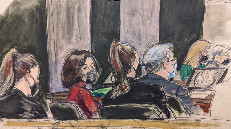 This courtroom sketch shows Ghislaine Maxwell seated at her defence table in red sweater, listening to testimony in her sex trafficking trial in New York on Wednesday. Elizabeth Williams / AP