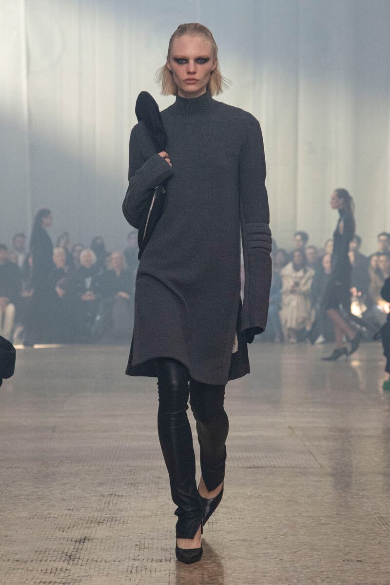 A tabbard dress over skinny-fit trousers at Helmut Lang. Photo: Helmut Lang