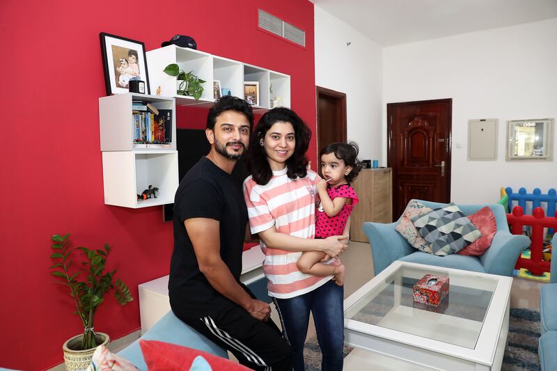 Habibullah Qureshi from Pakistan with his wife Mariam and daughter Zirwa in their one bedroom apartment. All photos: Pawan Singh / The National