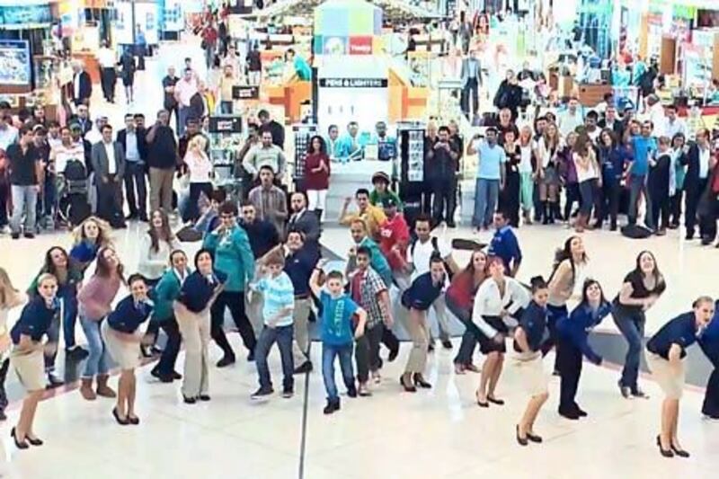 A flash mob breaks into dance in Dubai International Airport last year to promote the DBX Connect pre-paid credit card. Courtesy DXBconnect