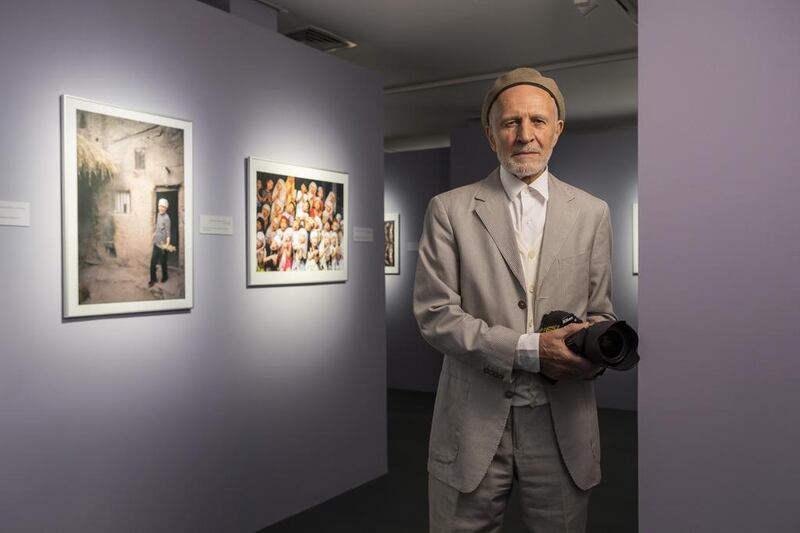 Renowned British photographer Peter Sanders at his exhibition in Sharjah, which highlights the life of Muslim in China. Antonie Robertson / The National 