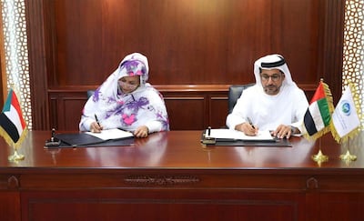 Mohammed Saif Al Suwaidi, Director General of ADFD, and Amna Mirgani Hassan, General Manager of the Capital Markets Department of CBOS, signed an agreement confirming the US$250 Million deposit into Central Bank of Sudan at the Fund’s headquarters in Abu Dhabi. Courtesy Abu Dhabi Fund for Development