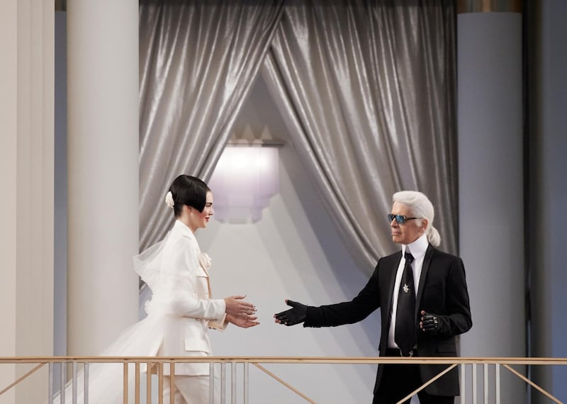 A handout photo showing Kendall Jenner and Karl Lagerfeld at the Chanel show as part of Paris Fashion Week Haute Couture Fall/Winter 2015/2016 at the Grand Palais on July 7, 2015 in Paris, France. (Photo by Olivier Saillant) *** Local Caption ***  al12jl-cover-chanel.jpg