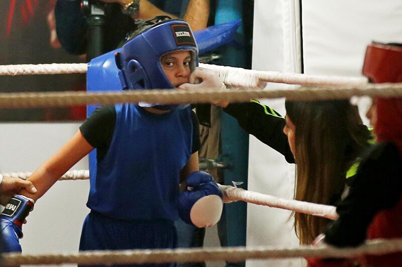 A Palestinian girl takes part in a rare boxing championship in Gaza City. Reuters