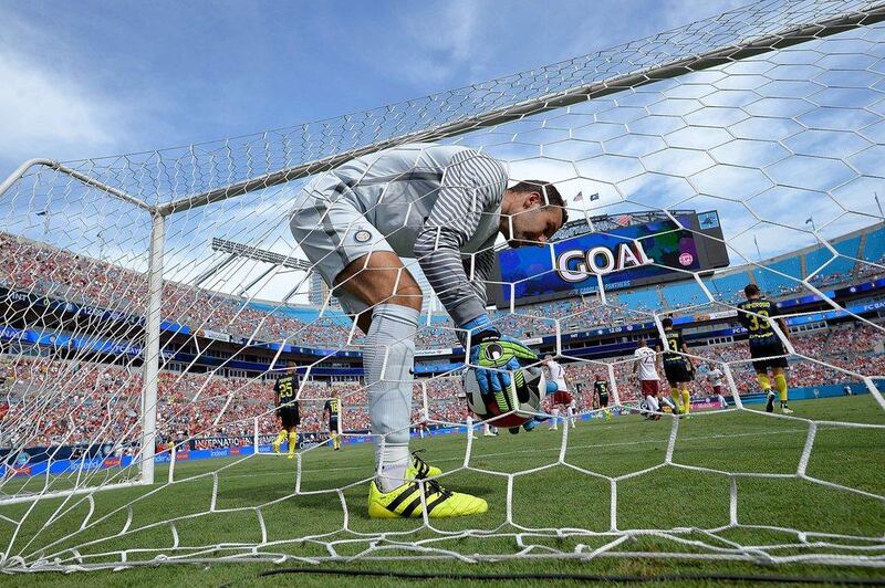 Samir Handanovic of Inter Milan picks the ball out of the back of the net after a goal by Franck Ribery of Bayern Munich during an International Champions Cup match at Bank of America Stadium on July 30, 2016 in Charlotte, North Carolina. Grant Halverson / Getty Images / AFP