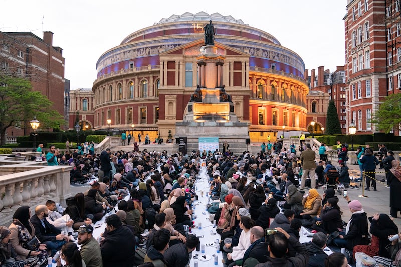People gather at the ‘Open Iftar 2022’ on the steps of the Royal Albert Hall in London. PA