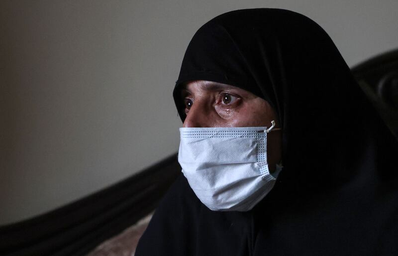The mother of Omar Seif, who disappeared from the northern Lebanese city of Tripoli's neighbourhood of Wadi Al Nahle, cries during an interview held weeks before she found out that Omar was killed in Iraq after joining ISIS.