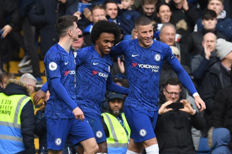 Willian celebrates scoring the third goal in Chelsea's 4-0 Premier League win over Everton. EPA