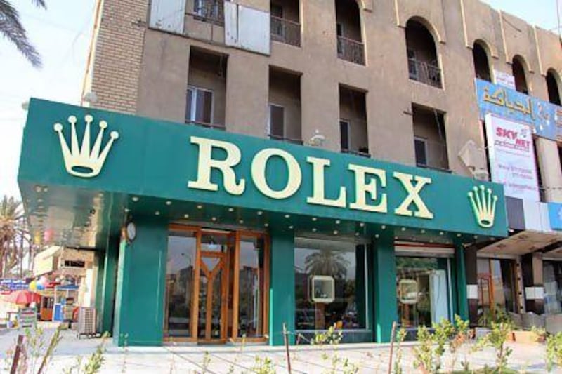 While the shop is an imitation of a typical Rolex store, owner Ali Abodi says the timepieces for sale are genuine. Hadeel Al Sayegh / The National
